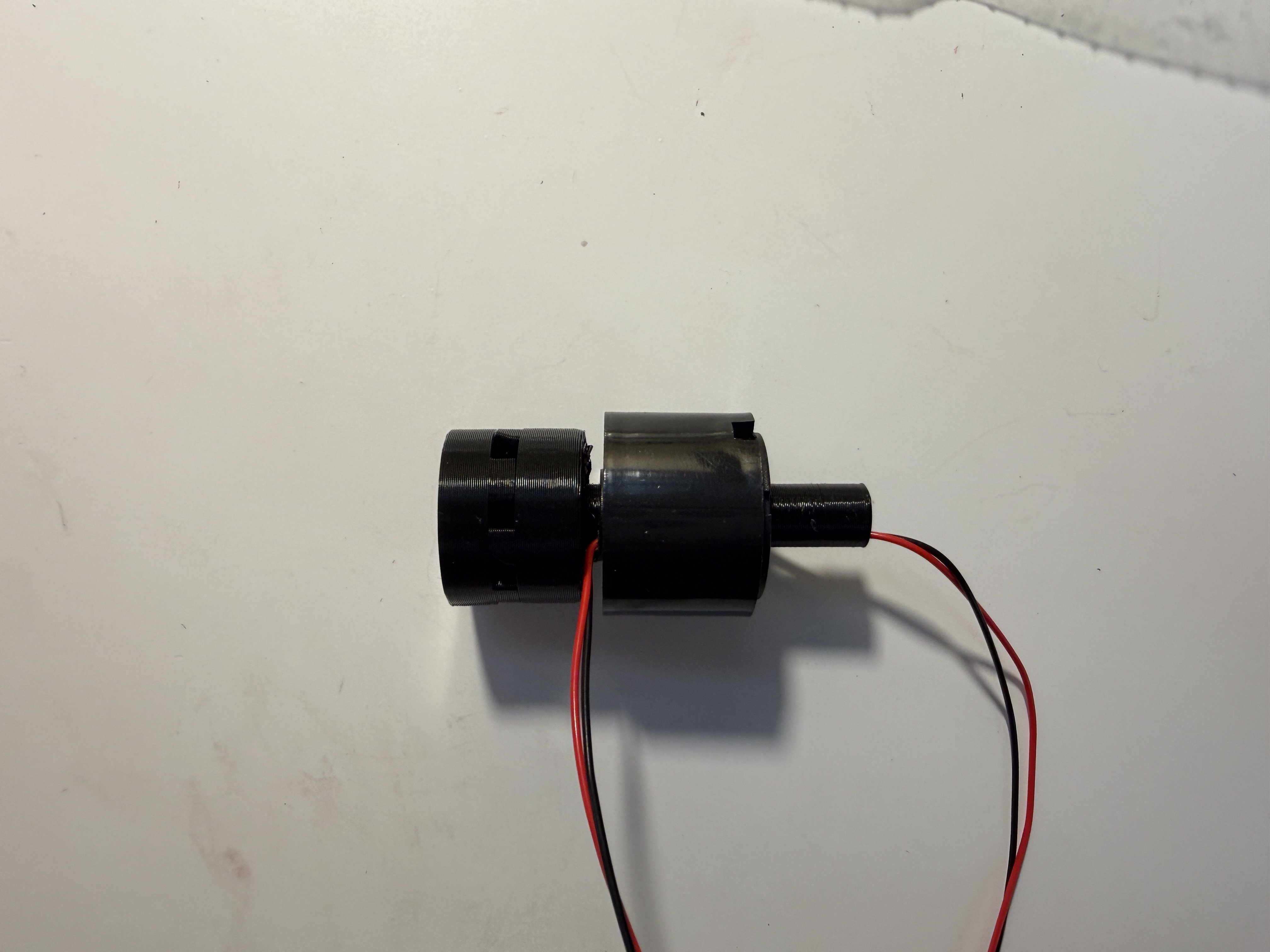 Slip ring, rod, and dog clutch assembly